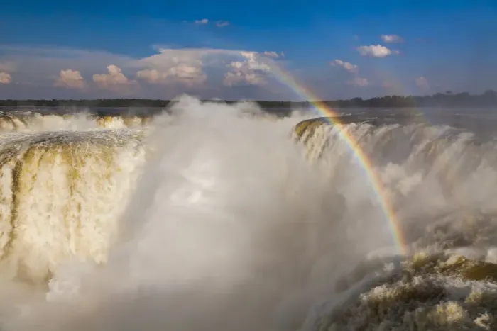 Framed Print : Rainbow over the Iguazu Falls at sunset