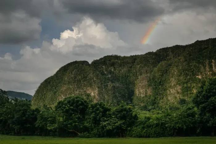 Framed Print : Rainbow over mogotes in ViAnales valley, in Cuba Framed Print : Rainbow over mogotes in ViAnales valley, in Cuba