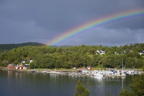 Rainbow over a port, Lauvsnes, Flatanger, Nord-Trondelag, Trondelag, Norway