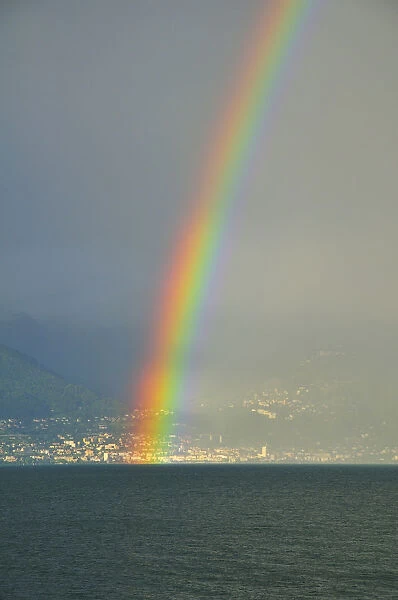 Rainbow on the shore at Lausanne, Switzerland, from France, Lake Geneva, Lac Leman, Evian-les-Bains, Haute-Savoie, Rhone-Alpes, France