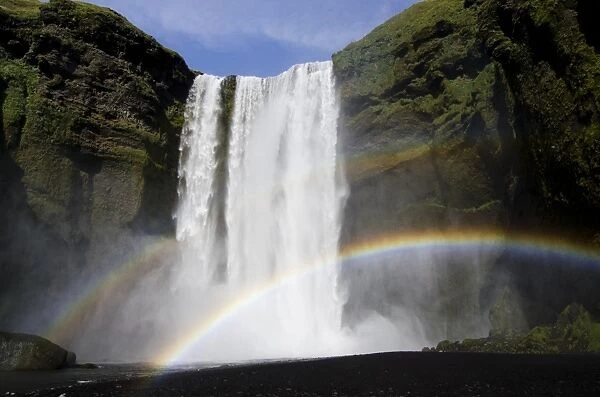 Rainbow, Skogafoss waterfall on the Skoga river, ring road, Suourland, Sudurland, southern Iceland, Iceland, Europe