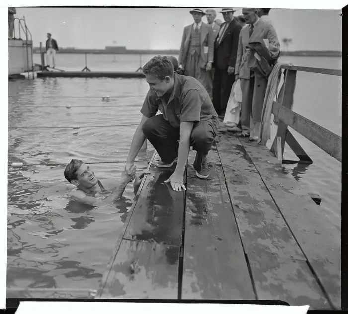 Framed Print : Ralph Flanagan in Pool Shaking Hands with Adolph Kiefer