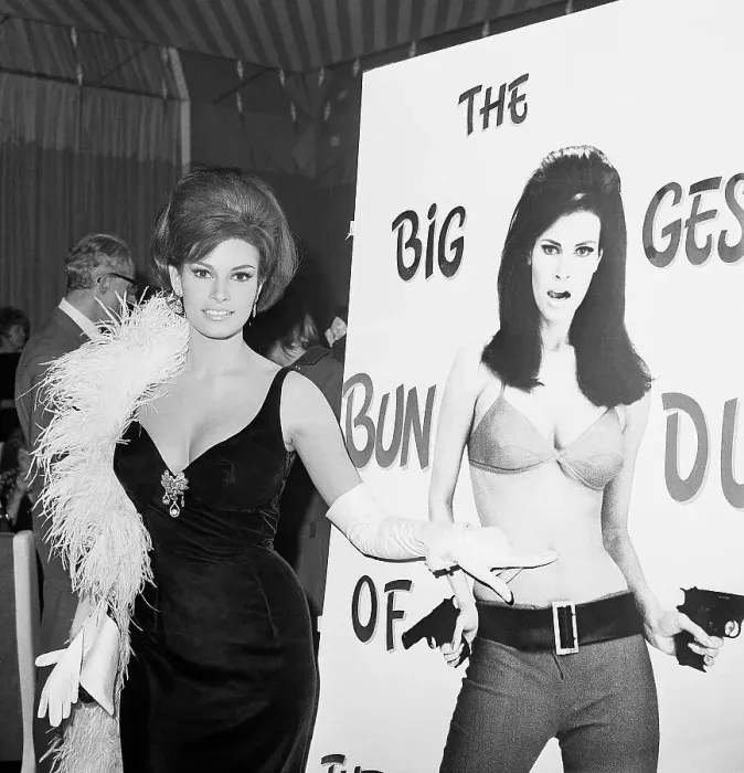 Framed Print : Raquel Welch Standing By a Poster of Herself Framed Print : Raquel Welch Standing By a Poster of Herself