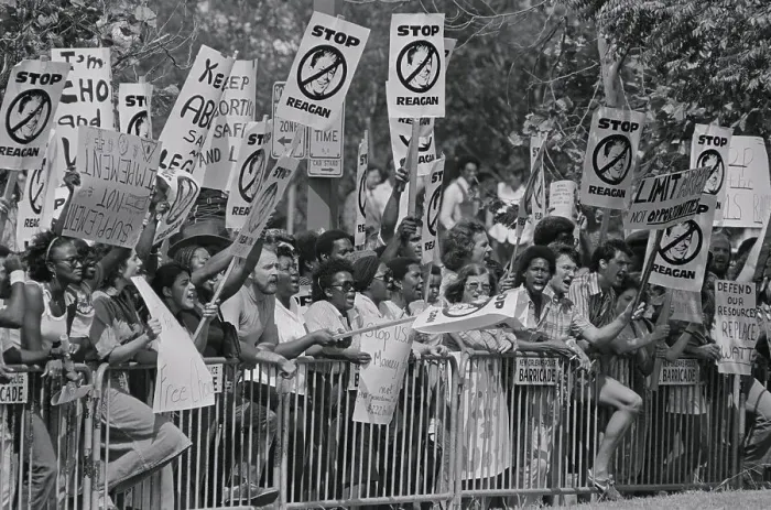 Framed Print : Reagan Protesters Holding up Signs Framed Print : Reagan Protesters Holding up Signs