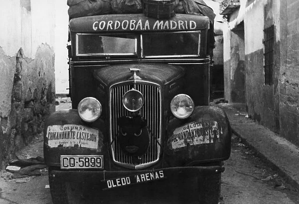 Rebel Truck. A rebel supply lorry in a street of San Martin during the Spanish Civil War