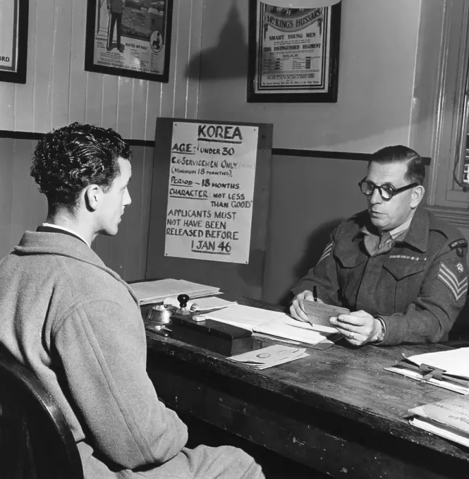 Framed Print : Recruit. A Sergeant Major interviews one of the many volunteers for service in Korea Framed Print : Recruit. A Sergeant Major interviews one of the many volunteers for service in Korea