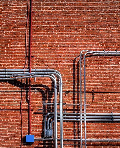 Red Brick Wall With Pipes