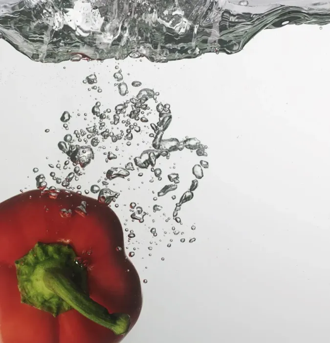 Framed Print : Red capsicum falling into water Framed Print : Red capsicum falling into water