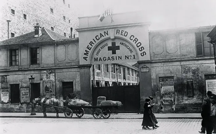 Framed Print : Red Cross Building with Pedestrians and Wagon in Front Framed Print : Red Cross Building with Pedestrians and Wagon in Front