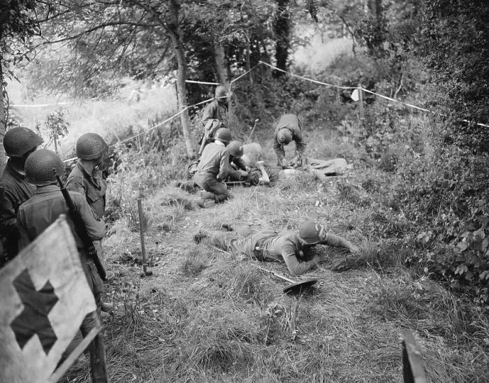 Framed Print : Red Cross and Medic Team with Injured Engineers at Camp