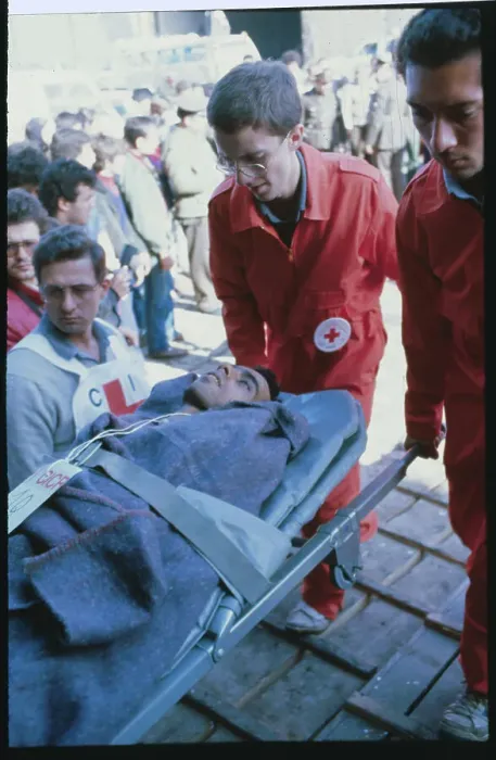 Framed Print : Red Cross Worker Transporting Wounded Soldier