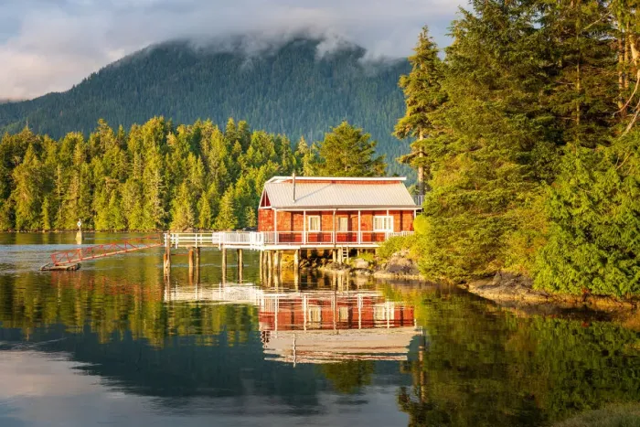 Framed Print : Red dock house with pier over the harbour water in Tofino, Vancouver Island, Canada Framed Print : Red dock house with pier over the harbour water in Tofino, Vancouver Island, Canada