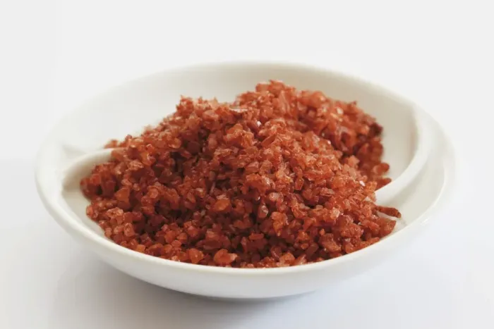 Framed Print : Red Hawaiian sea salt in a small porcelain bowl Framed Print : Red Hawaiian sea salt in a small porcelain bowl