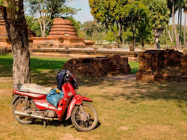 A red scooter in Sukhothai