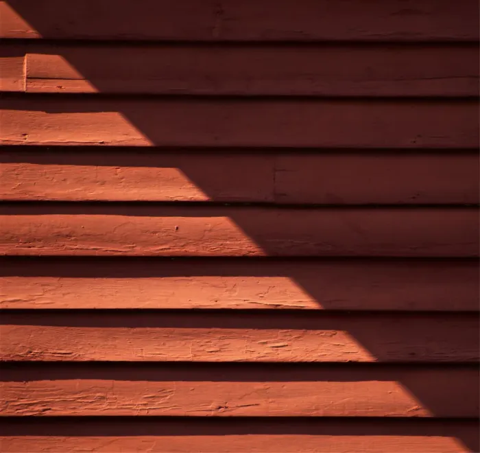 Framed Print : Red Shade. A color photograph of the wooden wall to a commercial building Framed Print : Red Shade. A color photograph of the wooden wall to a commercial building