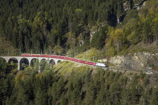 Red train in the mountains