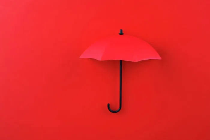 Framed Print : Red Umbrella on Red Background