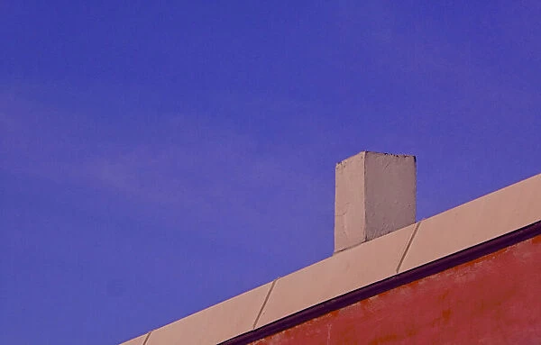 Red Wall. A color photo of a red commercial building in southeast Portland