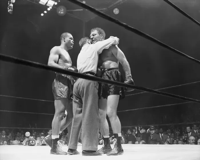 Framed Print : Referee Comforting Lee Savold After Joe Louis Win Framed Print : Referee Comforting Lee Savold After Joe Louis Win