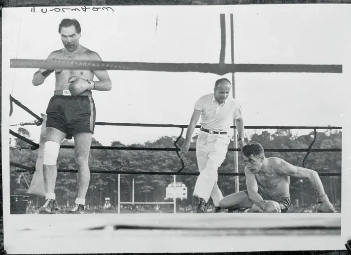 Framed Print : Referee Counting Out a Downed Boxer