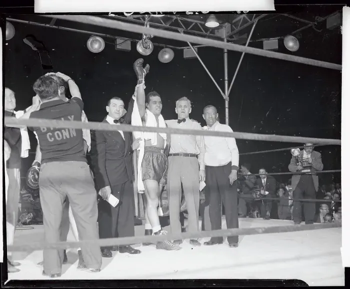 Framed Print : Referee Raising Hand of Joe Louis After Victory Framed Print : Referee Raising Hand of Joe Louis After Victory
