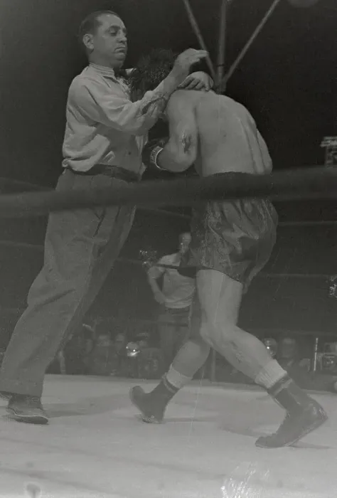 Framed Print : Referee Restraining Boxer Rocky Graziano Framed Print : Referee Restraining Boxer Rocky Graziano