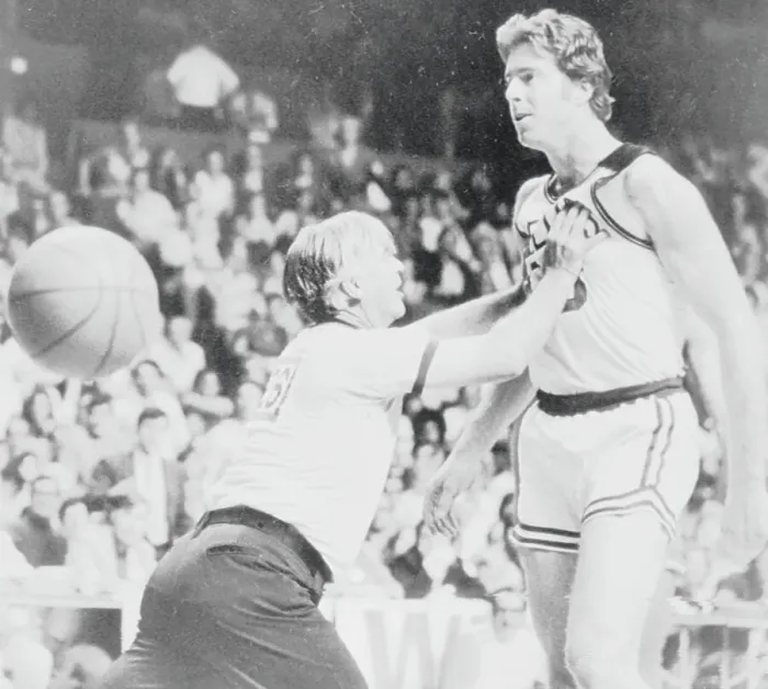 Framed Print : Referee Restraining Dave Cowens During Basketball Game Framed Print : Referee Restraining Dave Cowens During Basketball Game