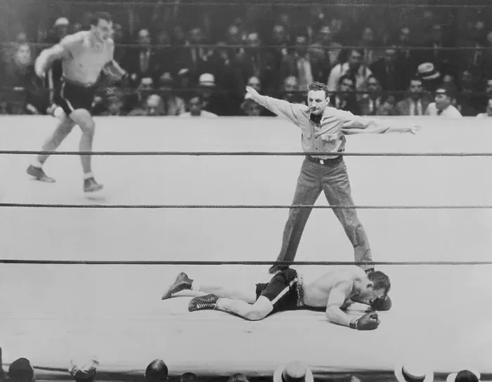 Framed Print : Referee Standing over Boxer Framed Print : Referee Standing over Boxer