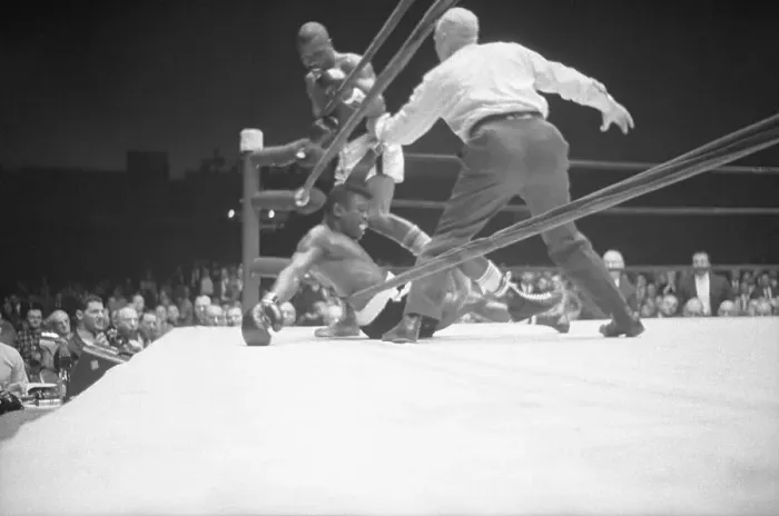 Framed Print : Referee Standing over Boxer on Ropes Framed Print : Referee Standing over Boxer on Ropes