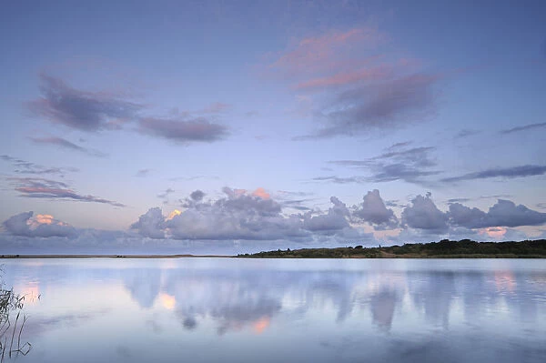 Reflected clouds in shoreline estuary system, St Lucia, Kwazulu-Natal, South Africa