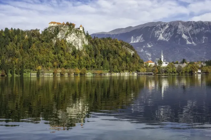 Framed Print : Reflection of Bled Castle overlook Lake Bled, surrounded with high mountains of