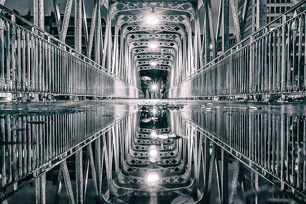 Reflection on the bridge of the port of Arsenal