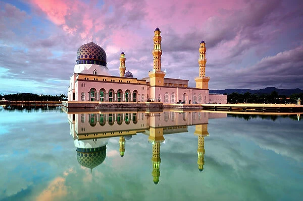 Reflection of Kota Kinabalu city mosque at sunset