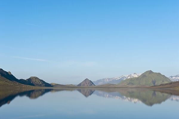 Reflection in the still lake, panoramic mountain landscape at Alftavatn lake, Laugavegur trekking route, Highlands, Sudurland, Iceland
