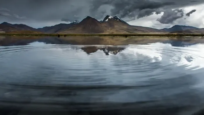 Framed Print : reflection of mountains with ripple foreground Framed Print : reflection of mountains with ripple foreground