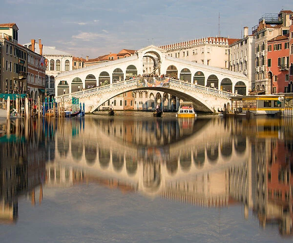 Reflection of Rialto Bridge in Grand Canal of Venice