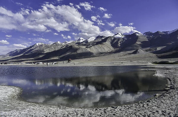Reflection View of mountain at Pangong Lake with blue sky in summer, Leh Ladakh, North India