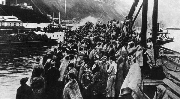 Refugees. 1917: Refugees stand on the deck of a ship during the Russian Revolution