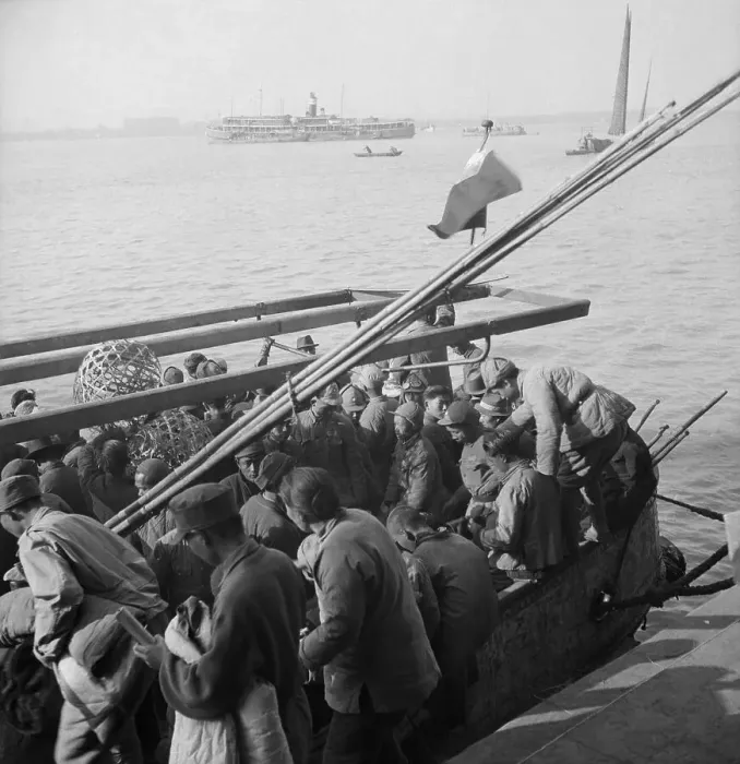 Framed Print : Refugees Crowd Onto Boat Leaving China Framed Print : Refugees Crowd Onto Boat Leaving China