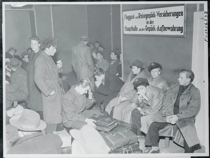 Framed Print : Refugees Gathered at Airport for Transport Framed Print : Refugees Gathered at Airport for Transport