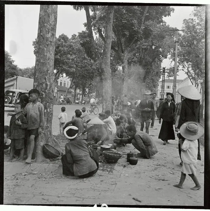 Framed Print : Refugees Gathering Next to a Thoroughfare Framed Print : Refugees Gathering Next to a Thoroughfare