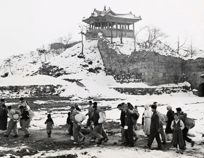 Framed Print : Refugees Walking Past Hwaseong Fortress Framed Print : Refugees Walking Past Hwaseong Fortress