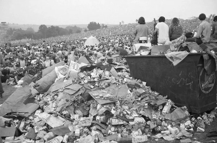 Framed Print : Refuse Overflows a Trash Bin After Woodstock Framed Print : Refuse Overflows a Trash Bin After Woodstock