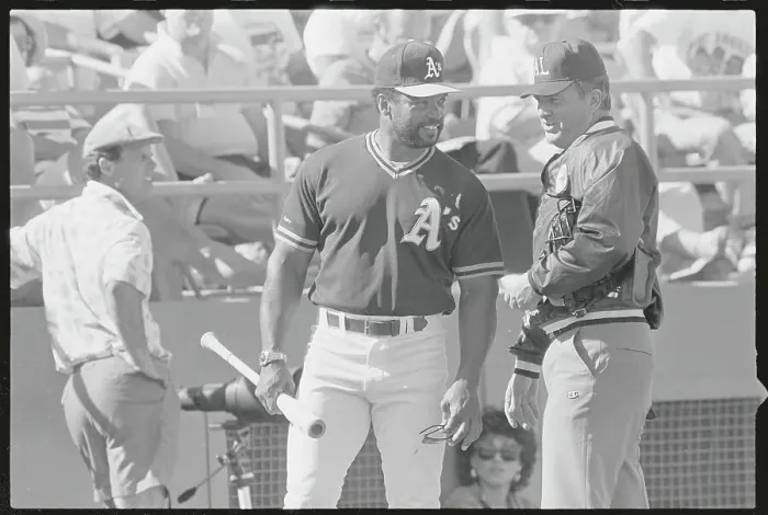 Framed Print : Reggie Jackson Conversing with Larry McCoy Framed Print : Reggie Jackson Conversing with Larry McCoy