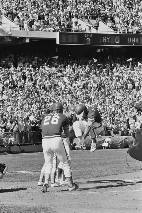 Framed Print : Reggie Jackson Leaping up to Cross Home Plate Framed Print : Reggie Jackson Leaping up to Cross Home Plate