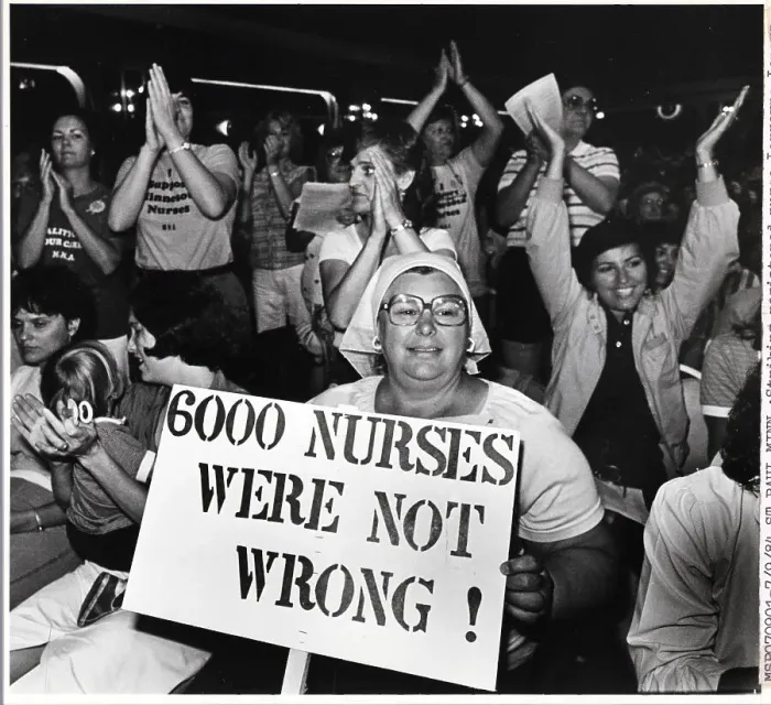 Framed Print : Registered Nurses with Signs Cheer at Meeting Framed Print : Registered Nurses with Signs Cheer at Meeting