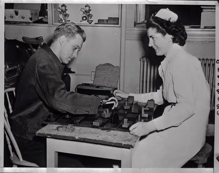 Framed Print : Rehabilitating Soldier Learning to Use His Prosthetic Fingers Framed Print : Rehabilitating Soldier Learning to Use His Prosthetic Fingers
