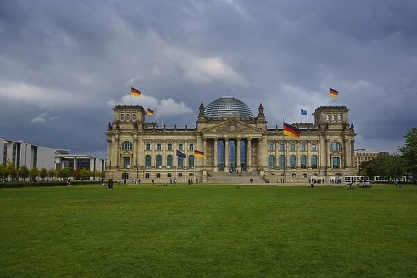 Reichstag building under a cloudy sky, Berlin, Germany