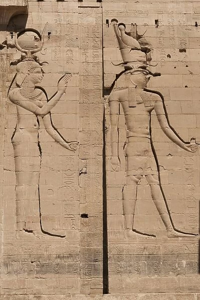 Relief of Isis and her son Horus at Temple of Isis in Philae
