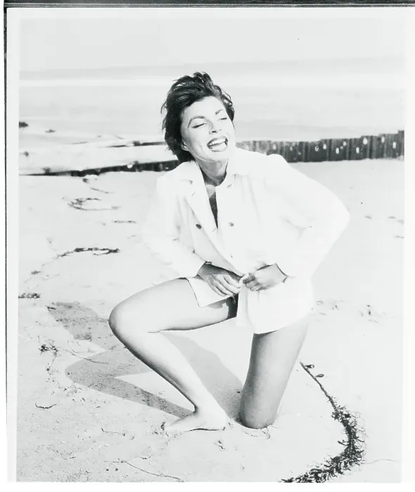 Framed Print : Renee Marshall Kneeling on Beach Framed Print : Renee Marshall Kneeling on Beach